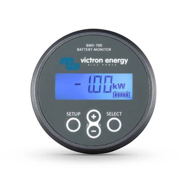 Frontal view of the circular BMV-700 monitor showing a 1.00kW power reading