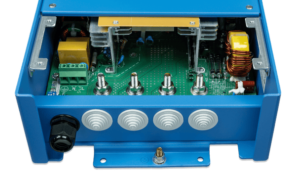 Internal view of Centaur 12/40 charger showing AC/DC terminals and configuration DIP switches