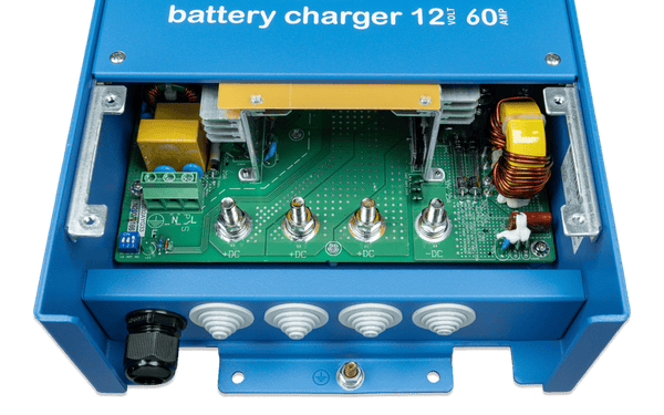 Internal view of Centaur battery charger showing DC output studs and AC input terminals