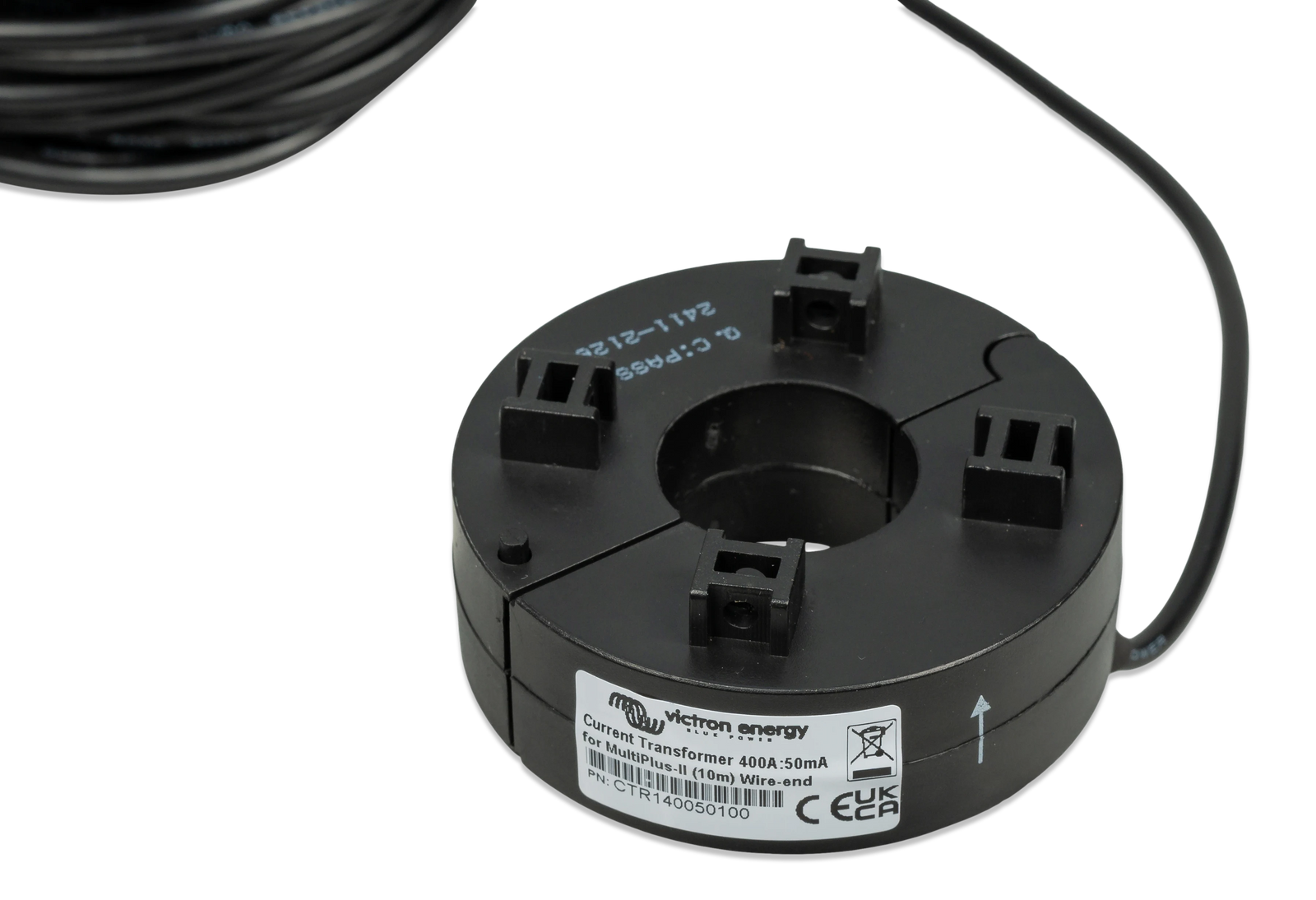 Underside view of current transformer showing mounting clips and Victron Energy identification label