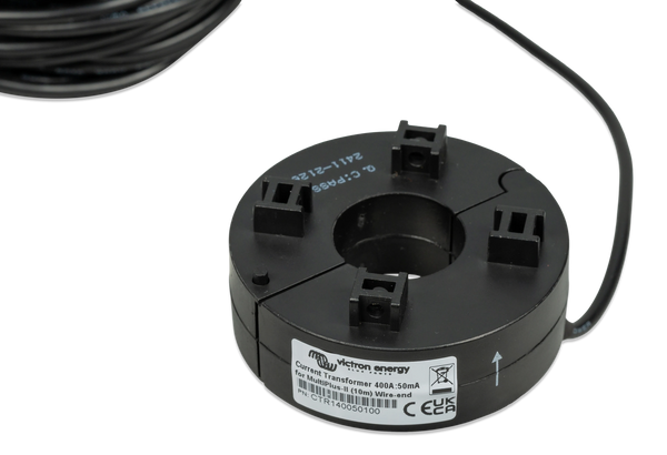 Underside view of current transformer showing mounting clips and Victron Energy identification label