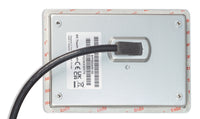 Close-up of integrated connection cable entry and identification label on the rear of the monitoring screen