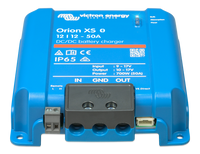 Angled view of Victron Orion XS charger showing recessed screw terminals and remote port