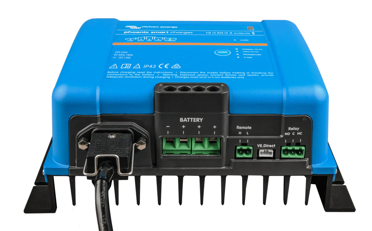 Connection panel of a Victron battery charger showing AC input and DC output terminals