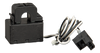 Close-up of black split-core current transformer with wiring harness and plug