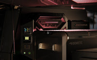 Night view of an open canopy with the Voyager system illuminating the storage area