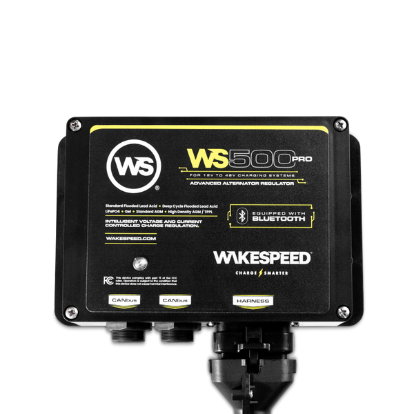 Wakespeed WS500 Pro alternator regulator with wiring harness attached on black background