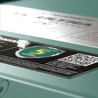 Close-up of 5-year warranty badge and QR code on the battery casing