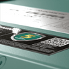 Close-up of 5-year warranty badge and QR code on the battery casing
