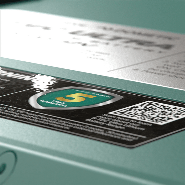 Close-up of 5-year warranty badge and QR code on the battery casing