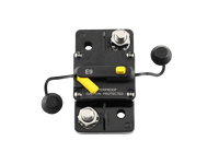 Top view of circuit breaker with caps removed exposing stainless steel studs