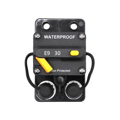 Front view of 30A waterproof DC circuit breaker with manual reset switch and protective caps