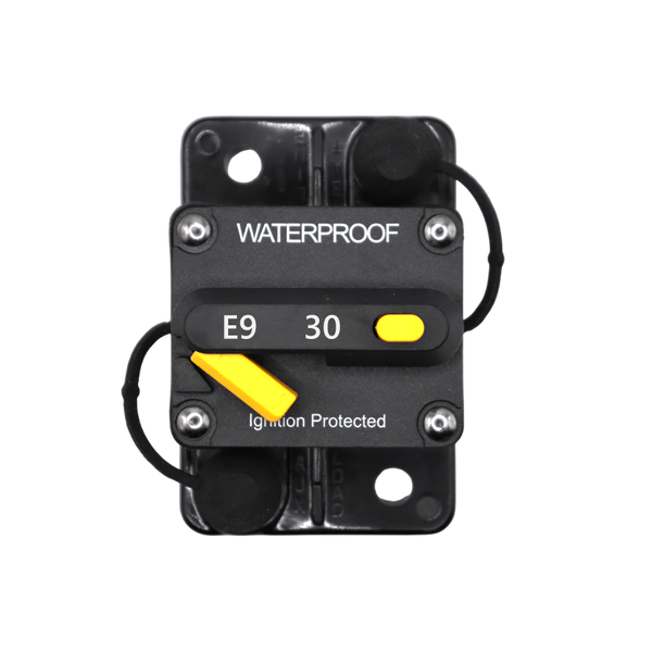 Top view of 30A waterproof circuit breaker with yellow reset lever and protective caps