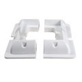Set of four white ABS plastic corner brackets for solar panel mounting arranged in a square
