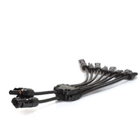 Side view of bundled solar branch connectors highlighting the moulded splitter blocks